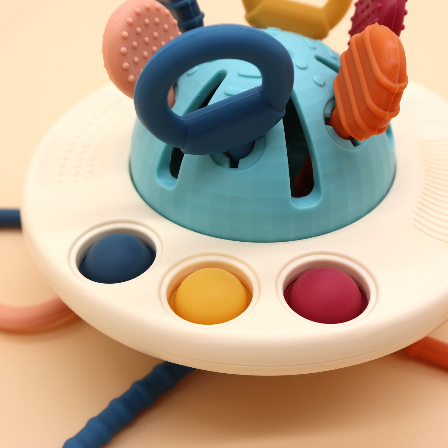 Tenta Play Pull Toy – colorful sensory baby toy with textured pull cords