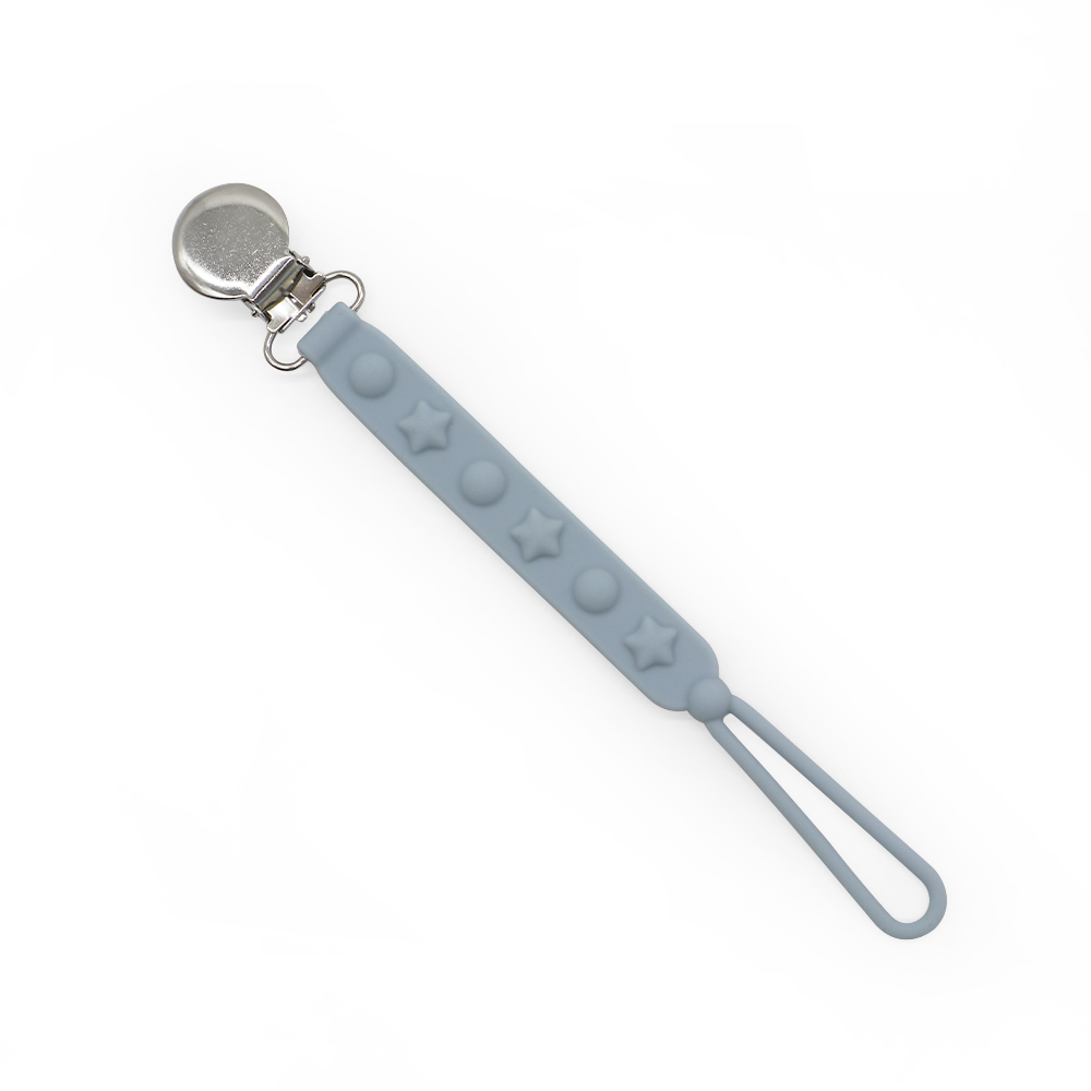 Blue silicone pacifier clip with star and dot design, stainless steel clasp and loop attachment.