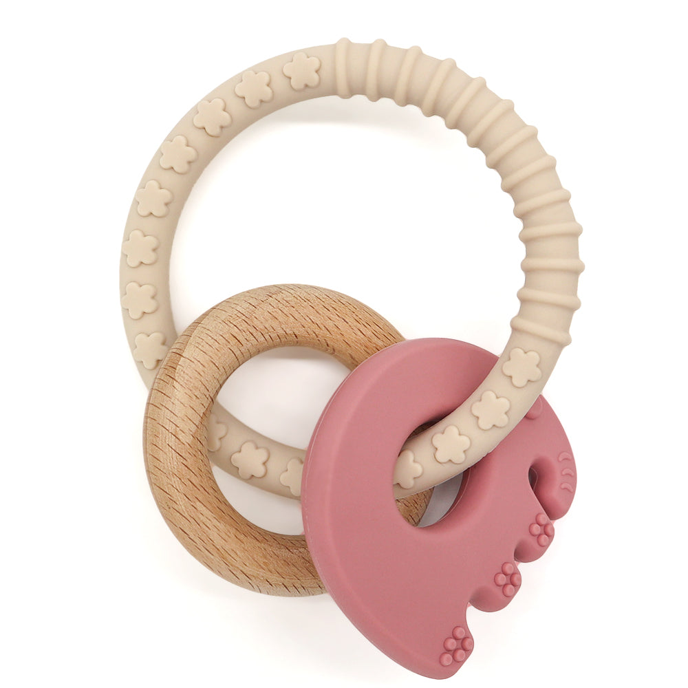 Mini Wander Chew baby teether with silicone and wooden rings in soft colors