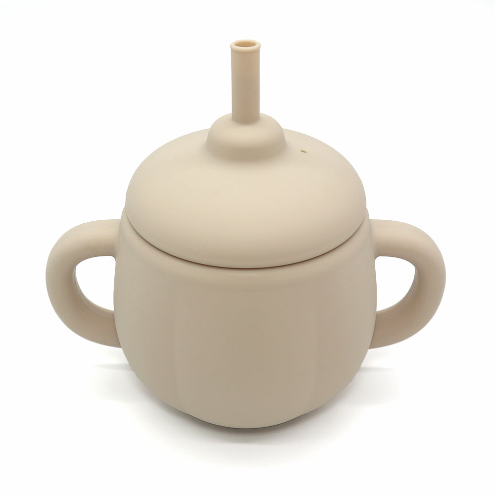 3-in-1 FlexiSip silicone training cup in rose pink with handles and straw – convertible baby cup for drinking transitions