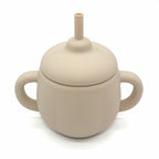 3-in-1 FlexiSip silicone training cup in rose pink with handles and straw – convertible baby cup for drinking transitions