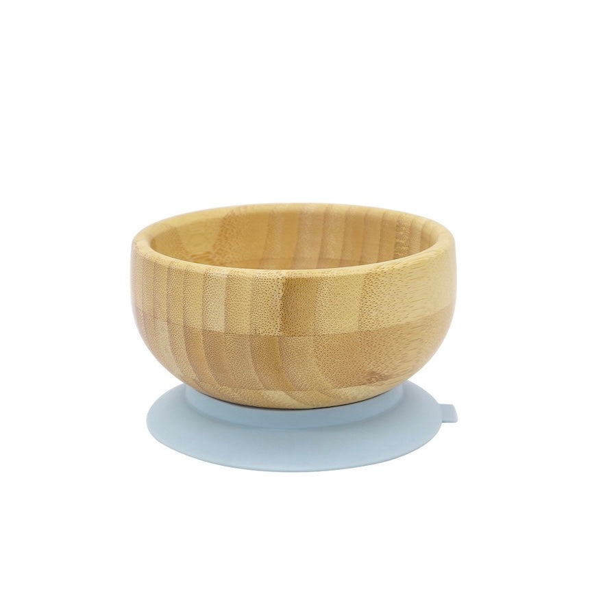 “Bamboo suction bowl for toddlers with dusty blue silicone base, non-slip and food-safe”