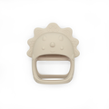 Beige Dino Bite silicone teether with easy grip for babies