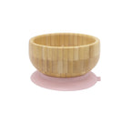 “Bamboo baby bowl with rose pink silicone suction base, perfect for baby-led weaning”
