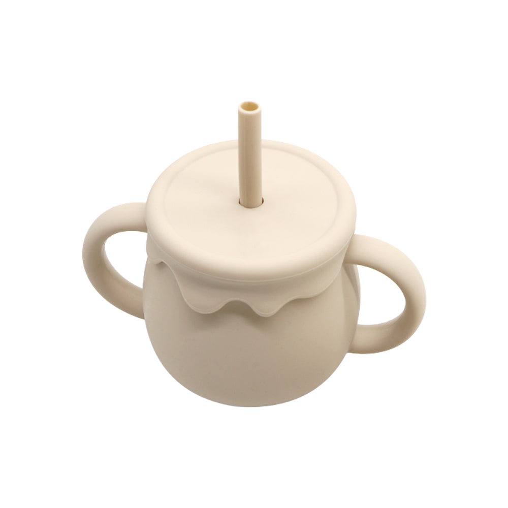 Beige silicone Sip and Snack Cup with two interchangeable lids – straw cup and snack container