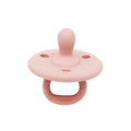 Soothe Dot baby pacifier in rose pink – soft one-piece silicone soother